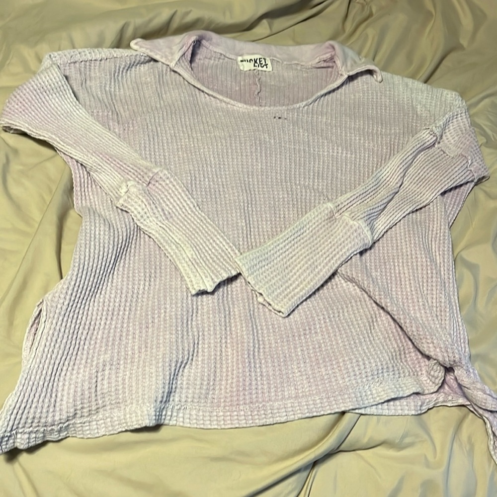Bucket list brand, bought at a boutique. Distressed purple color has a collar.